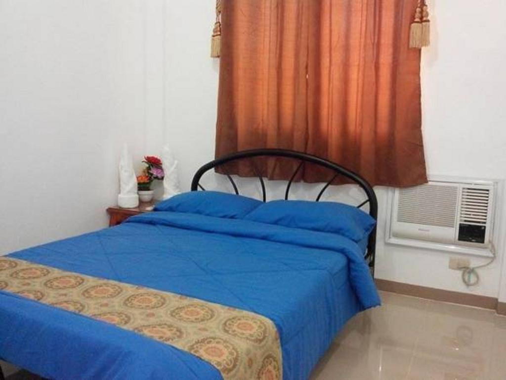 Rullan Apartelle Anda (Luzon) Quarto foto
