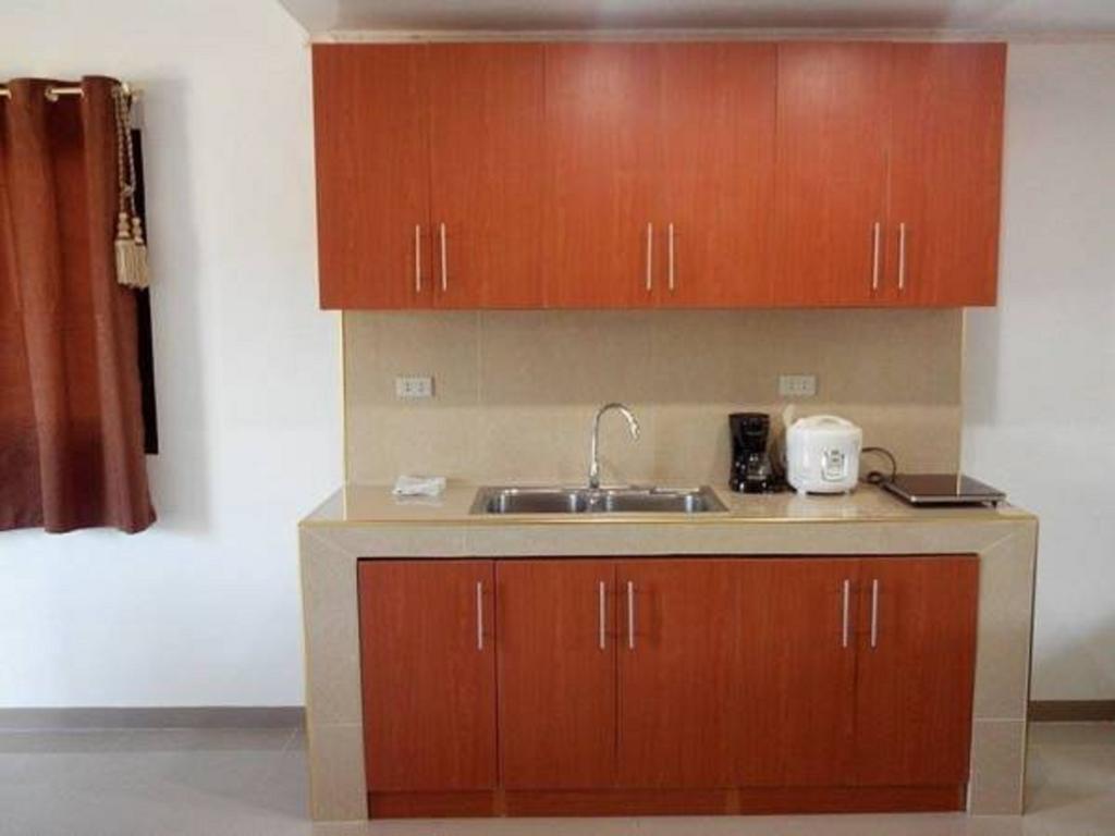 Rullan Apartelle Anda (Luzon) Quarto foto